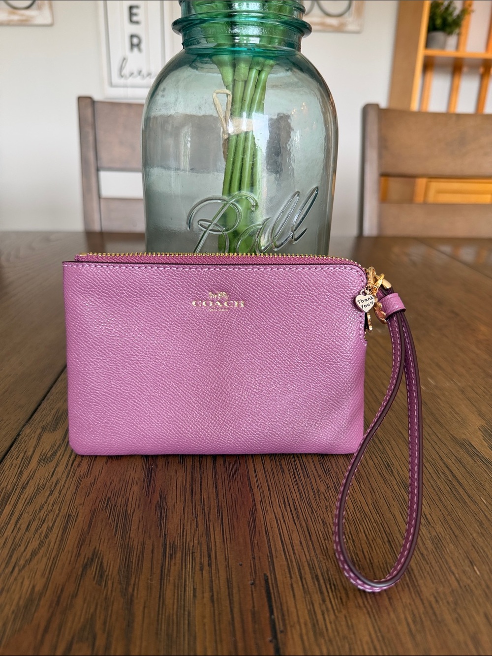**ITEM BUNDLE** Coach Pink Pebbled Leather Wristlet, earrings and charm!!